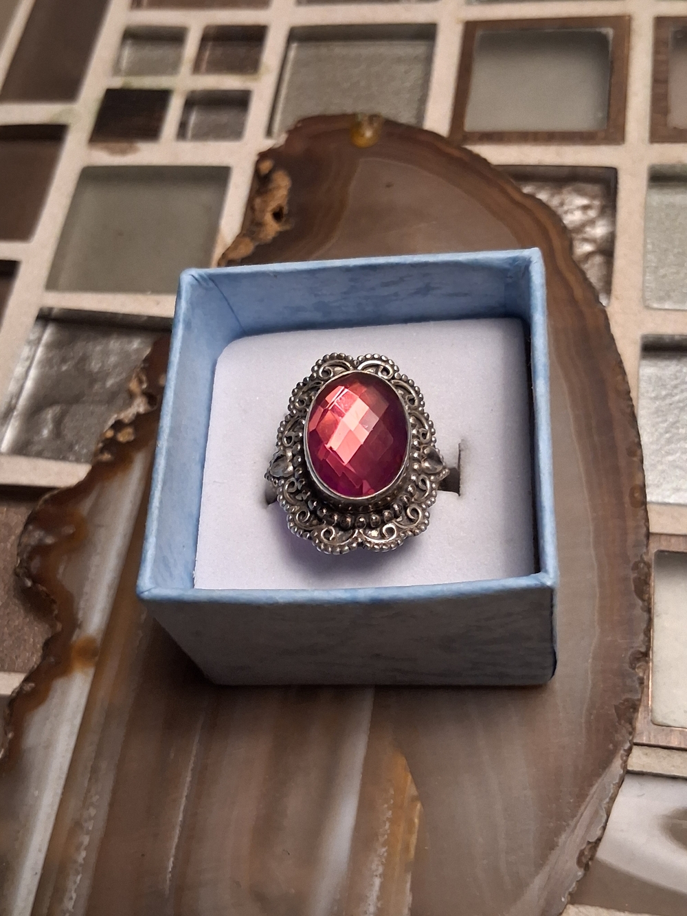 Ornate Silver Ring with Faceted Pink Oval Stone